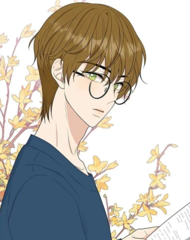 Young man with glasses, brown hair and green eyes